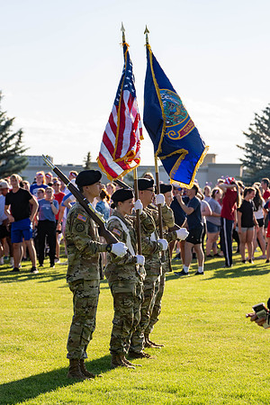 Students gather at the upper field for various 4th of July activities.