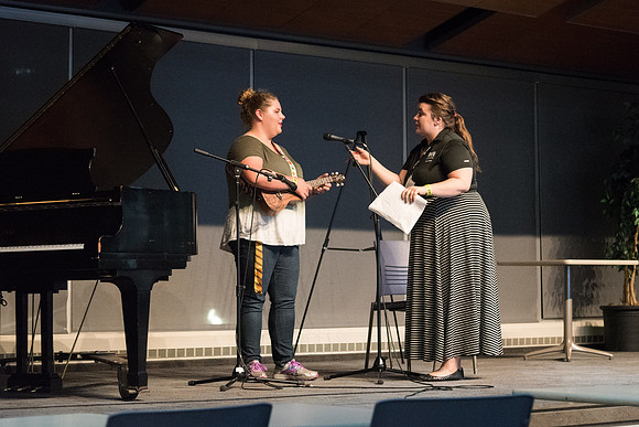 Students performs songs of their choice on the Crossroads stage at I-Night.
