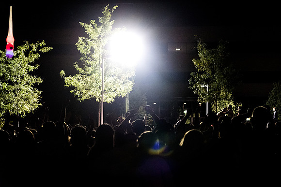 Students dance in the Quad in front of the Library at I-Night.