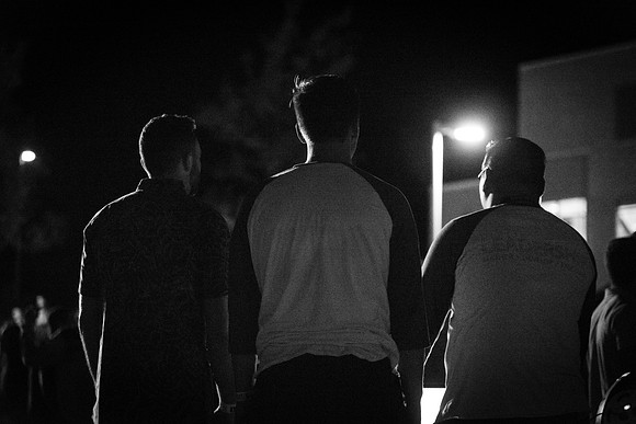 Students dance in the Quad in front of the Library at I-Night.