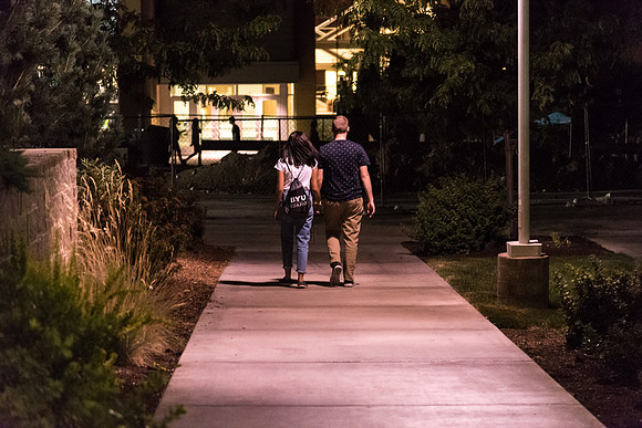 A couple walks hand-in-hand at I-Night.