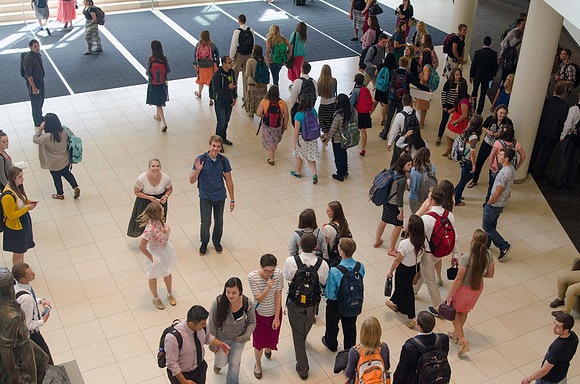 Students walking out on campus after devotional