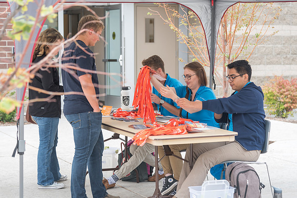 Student Support and other student volunteers help new students move in at the start of the Fall 2017 Semester.