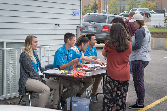 Student Support and other student volunteers help new students move in at the start of the Fall 2017 Semester.