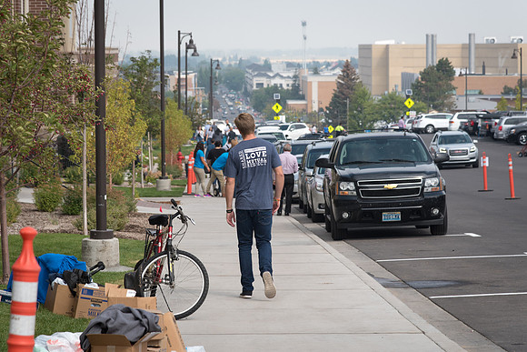 Many student volunteers help other students move in at the start of the semester.
