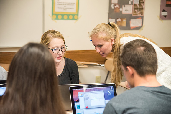 Students learn about College Success from Mark Orchard and their classmates through group discussions.