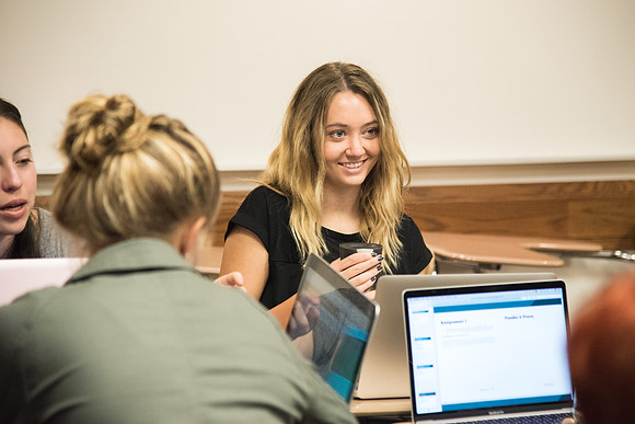 Students learn about College Success from Mark Orchard and their classmates through group discussions.