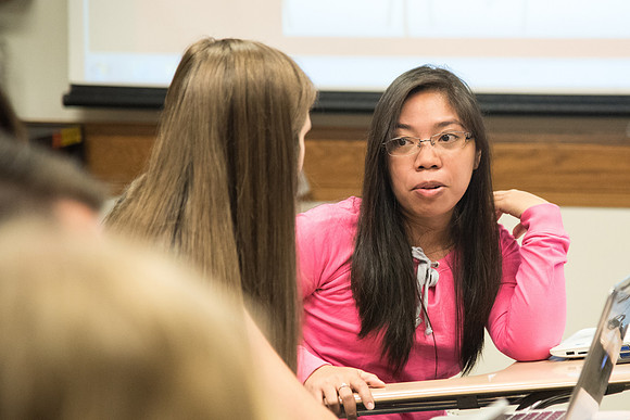 Students learn about College Success from Mark Orchard and their classmates through group discussions.