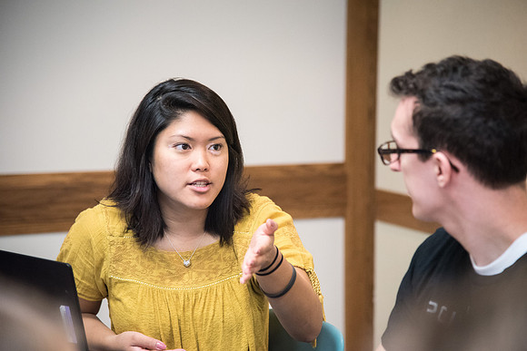 Students learn about College Success from Mark Orchard and their classmates through group discussions.
