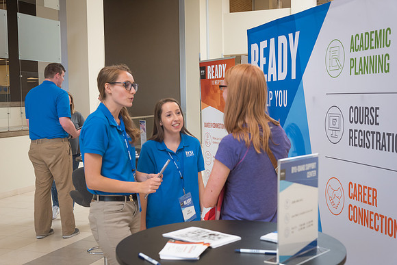 A kiosk is setup in the MC near Legacy Hall where students can get help with their academic planning.