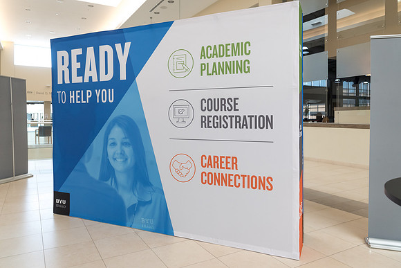 A kiosk is setup in the MC near Legacy Hall where students can get help with their academic planning.