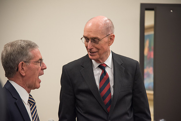 President Henry B. Eyring of the First Presidency speaks to Elder Bruce C. Hafen of the Seventy.