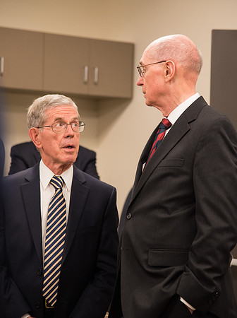 President Henry B. Eyring of the First Presidency speaks to Elder Bruce C. Hafen of the Seventy.