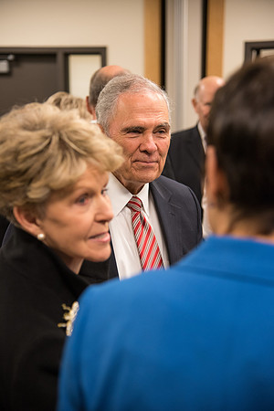 President Steven D. Bennion and his wife, Marjorie, speak to Elder David A. Bednar, and his wife, Susan.
