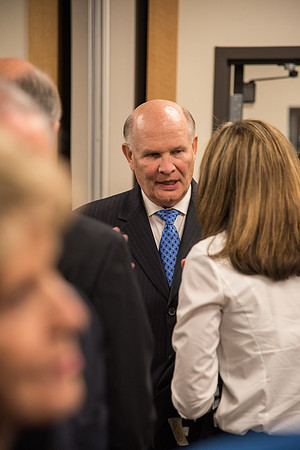 Elder Dale G. Renlund speaks to Sister Kelly C. Eyring.