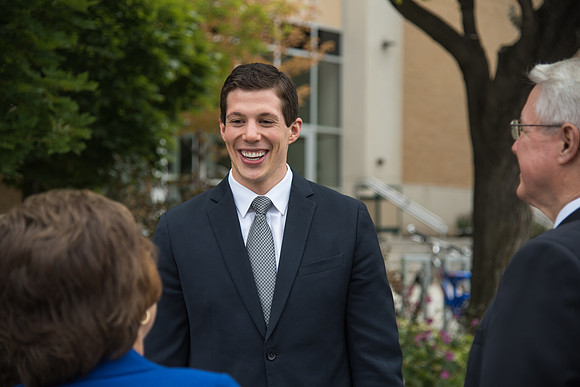 Henry Christian Eyring sees family friends on campus.