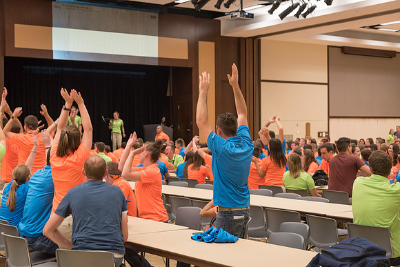 Student Support members break out in a dance at their dinner.