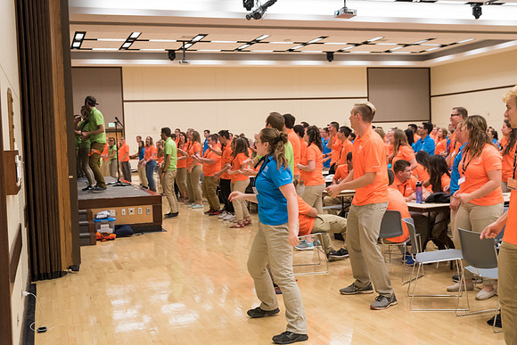 Student Support members break out in a dance at their dinner.