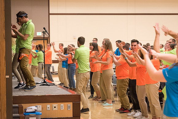 Student Support members break out in a dance at their dinner.