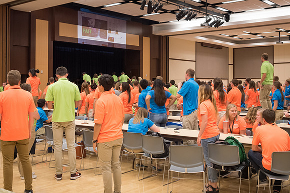 Student Support members break out in a dance at their dinner.