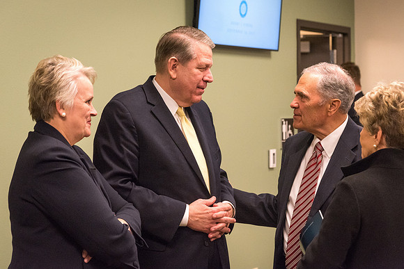 Donald L. Hallstrom and Sister Hallstrom speak with President and Sister Bennion. 2017
