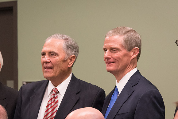 Elder Bednar and President Bennion stand together for the group photo of both previous and current Presidents of BYU-Idaho.