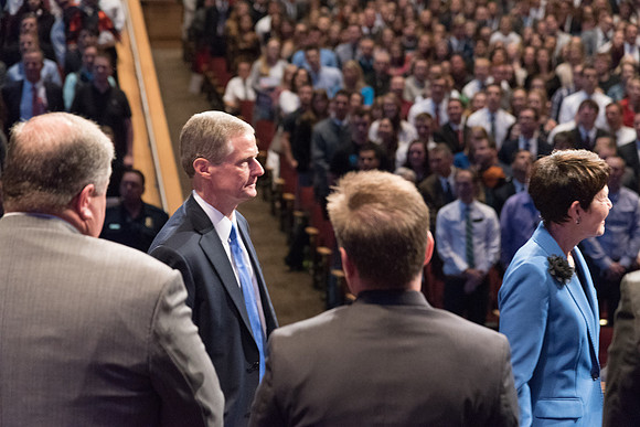 Elder David A. Bednar and Sister Bendar enter the BYU-Idaho Auditorium. 2017