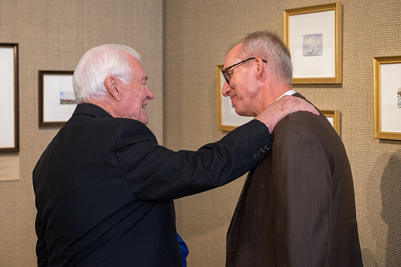 Friends and family gather in the Spori Art Gallery where President Henry B. Eyring's artwork is on display. Sept 19, 2017. President Christensen and Kelly Burgener