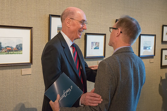 Friends and family gather in the Spori Art Gallery where President Henry B. Eyring's artwork is on display. Sept 19, 2017.