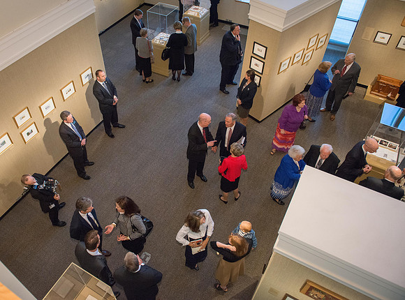 Friends and family gather in the Spori Art Gallery where President Henry B. Eyring's artwork is on display. Sept 19, 2017.