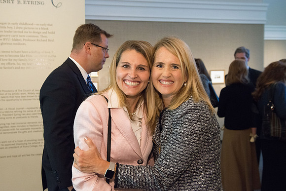 Friends and family gather in the Spori Art Gallery where President Henry B. Eyring's artwork is on display. Sept 19, 2017.