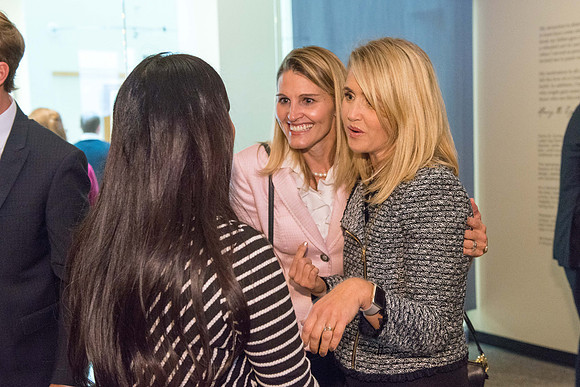 Friends and family gather in the Spori Art Gallery where President Henry B. Eyring's artwork is on display. Sept 19, 2017.