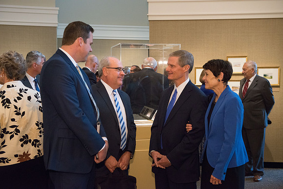 Friends and family gather in the Spori Art Gallery where President Henry B. Eyring's artwork is on display. Sept 19, 2017. Rob Garrett, Merv Brown, Elder and Sister Bednar
