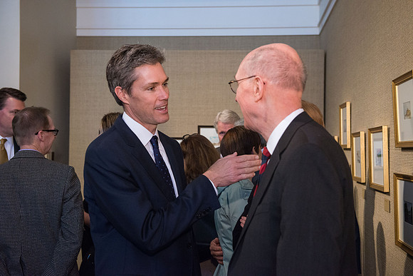 Friends and family gather in the Spori Art Gallery where President Henry B. Eyring's artwork is on display. Sept 19, 2017.