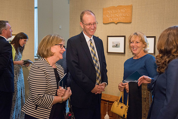 Friends and family gather in the Spori Art Gallery where President Henry B. Eyring's artwork is on display. Sept 19, 2017. Sister Bonnie Oscarson