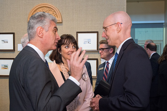 Friends and family gather in the Spori Art Gallery where President Henry B. Eyring's artwork is on display. Sept 19, 2017. President Henry J Eyring with Bishop Causse'