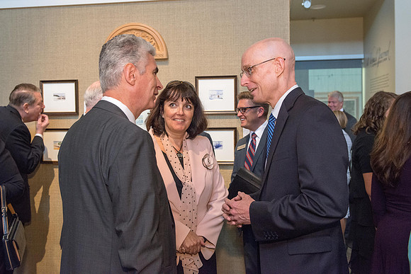 Friends and family gather in the Spori Art Gallery where President Henry B. Eyring's artwork is on display. Sept 19, 2017.