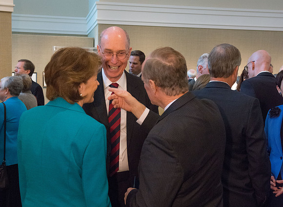 Friends and family gather in the Spori Art Gallery where President Henry B. Eyring's artwork is on display. Sept 19, 2017.