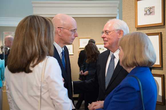 Friends and family gather in the Spori Art Gallery where President Henry B. Eyring's artwork is on display. Sept 19, 2017. President Henry J Eyring