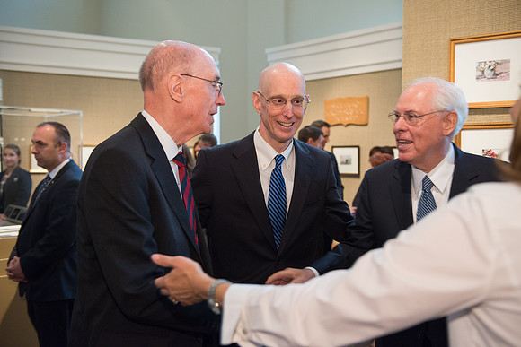 Friends and family gather in the Spori Art Gallery where President Henry B. Eyring's artwork is on display. Sept 19, 2017. President Henry B and Henry J. Eyring