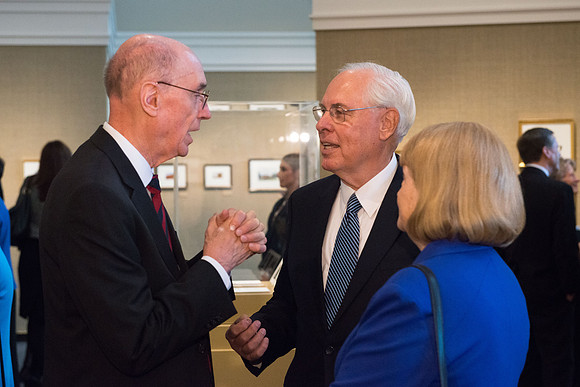 Friends and family gather in the Spori Art Gallery where President Henry B. Eyring's artwork is on display. Sept 19, 2017.