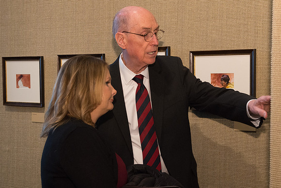 Friends and family gather in the Spori Art Gallery where President Henry B. Eyring's artwork is on display. Sept 19, 2017.