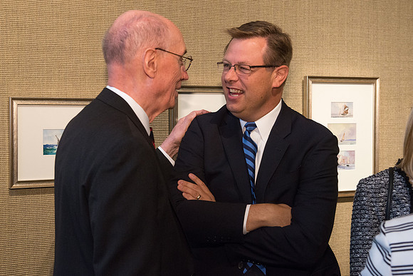 Friends and family gather in the Spori Art Gallery where President Henry B. Eyring's artwork is on display. Sept 19, 2017. President Henry B Eyring and President Gilbert.