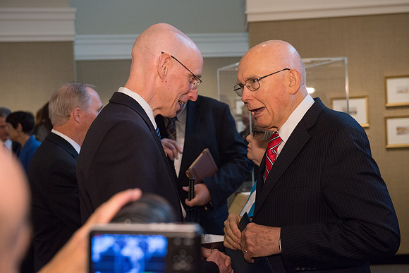 Friends and family gather in the Spori Art Gallery where President Henry B. Eyring's artwork is on display. Sept 19, 2017. President Henry J Eyring and Elder Dallin Oaks