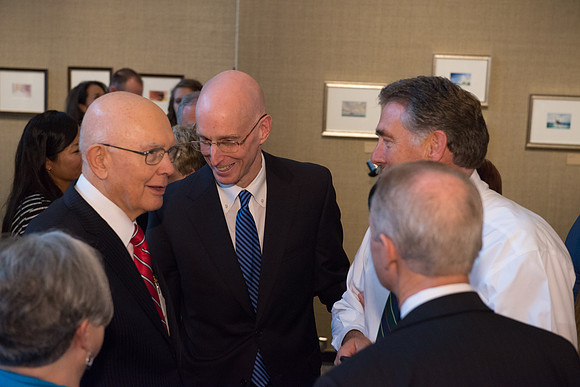 Friends and family gather in the Spori Art Gallery where President Henry B. Eyring's artwork is on display. Sept 19, 2017. President Henry J Eyring and Elder Dallin Oaks