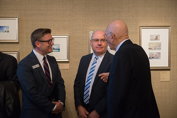 Friends and family gather in the Spori Art Gallery where President Henry B. Eyring's artwork is on display. Sept 19, 2017.