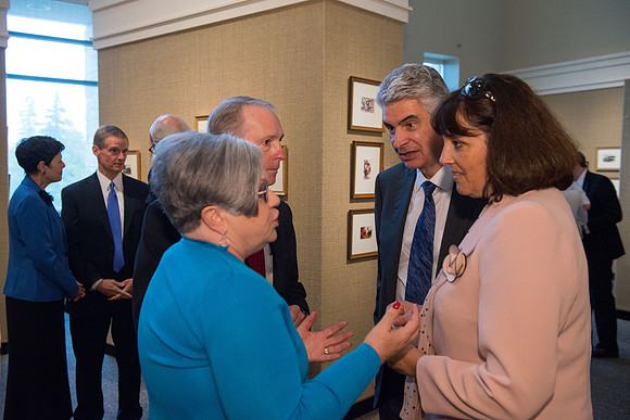 Friends and family gather in the Spori Art Gallery where President Henry B. Eyring's artwork is on display. Sept 19, 2017.