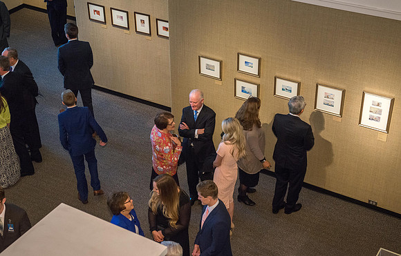 Friends and family gather in the Spori Art Gallery where President Henry B. Eyring's artwork is on display. Sept 19, 2017.