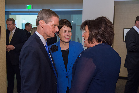 Friends and family gather in the Spori Art Gallery where President Henry B. Eyring's artwork is on display. Sept 19, 2017.