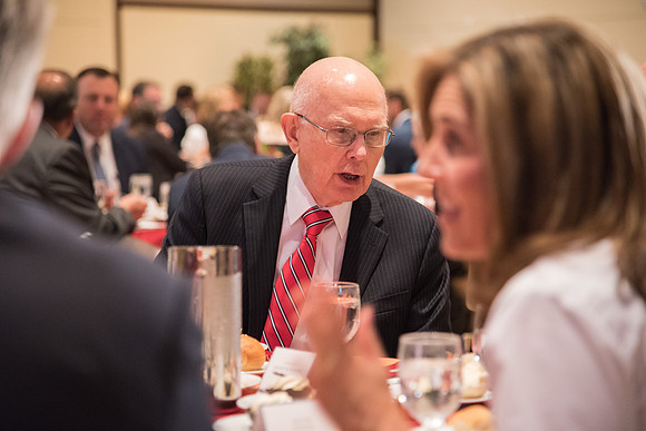 Elder Dallin H. Oaks makes conversation at the Inauguration Luncheon held in the MC Ballroom.